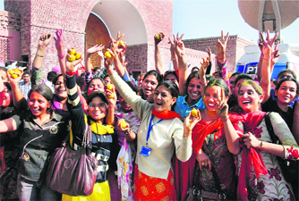 SAD supporters celebrating outside the residence of Parkash Singh Badal in Lambi village, Muktsar