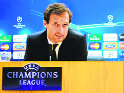 AC Milan's coach Massimiliano Allegri during a press conference on the eve of his teams Champions League match against Arsenal in London.