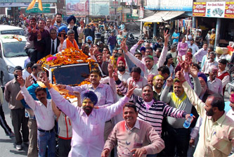 The newly-elected representative of Bathinda (Urban) in the state assembly, Sarup Chand Singla, holds a victory march to thank the residents of the constituency on Wednesday. 