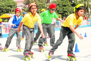 Children skate at the Ashmah International School at Sector 70 in Mohali on Wednesday