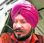 Bus driver Paramjit Singh talks to mediapersons at the bus stand in Khanna