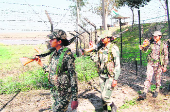 Women BSF constables guard the Indo-Pak border at Shahpur post near Ajnala.