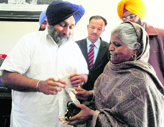 Akali Dal president Sukhbir Badal with his old nanny Chotto Rani at his native Badal village. 