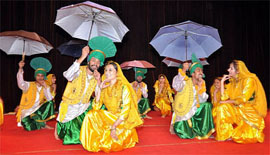 Medical students perform a colourful dance at the annual fest of the Adesh Institute of Medical Sciences and Research, Arrhythmia, in Bathinda on Friday.