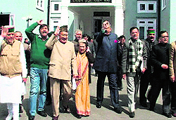 Congress MLAs raise slogans outside the Vidhan Sabha in Shimla on Friday