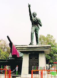 A rug placed on the gun of a tank adjoining the statue of martyr Major Bhupinder Singh outside the Government College for Women.