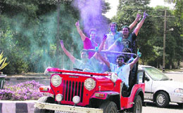 Youngsters in an open Jeep on the PAU campus.