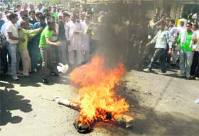 Protesters burn an effigy of the Chief Minister in Kurukshetra on Saturday