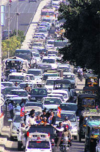Traffic movement takes a hit as a large number of BJP workers take out a rally to welcome BJP leader Bhagat Chunni Lal in Jalandhar on Saturday.