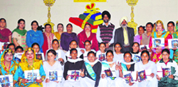 Students of Khalsa College for Women, Sidhwan Khurd, with their prizes.