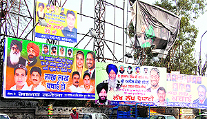 Hoardings celebrating the victory of the SAD-BJP alliance abound in Amritsar