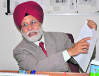 Professor BS Ghuman reads a paper at Panjab University in Chandigarh. 