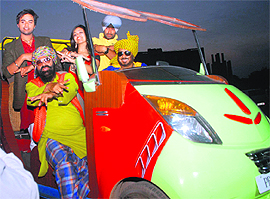 Comedian Jaspal Bhatti with crew members during the shooting of a Punjabi film “Power Cut” at the Sector - 42 lake in Chandigarh on Sunday
