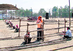 Preparations in full swing for the swearing-in ceremony of the new Chief Minister at the Parade Ground in Dehradun on Sunday