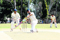 A batsman in action in a match in the 60th Dehradun District Cricket League Tournament in Dehradun on Sunday. 