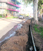 A view of the damaged road at Mahadev village in Sundernagar.