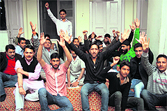 Members of the Udhampur District Congress stage a protest in Jammu on Sunday