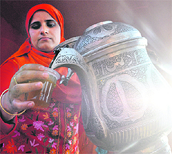 A Kashmiri woman serves Kahwa at the Regional Saras Fair at the Government College for Women in Ludhiana on Sunday