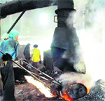 Workers at a steel rolling mill in Mandi Gobindgarh.