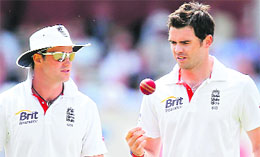 Englands Test captain Andrew Strauss (L) and fast bowler James Anderson. This is the first time, since the current rankings system was introduced in 2003, that England has topped the table at the cut-off date.