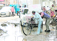 The damage to sewerage pipes leads to waterlogging on the Shaheed Bhagat Singh road in Amritsar