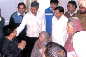 Sarup Chand Singla interacts with the organisors and the patients during the inauguration of an eye check-up camp organised by an NGO in Bathinda