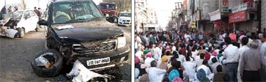 (Left) The badly mangled remains of the two vehicles involved in the mishap; a crowd gathered outside the jewellers shop in Post Office bazaar as news of the mishap spread