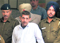 Jagbir Singh being produced at a district court in Chandigarh 