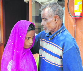 Saraswati with her father, Otul Sarkar, in Karnal on Monday.