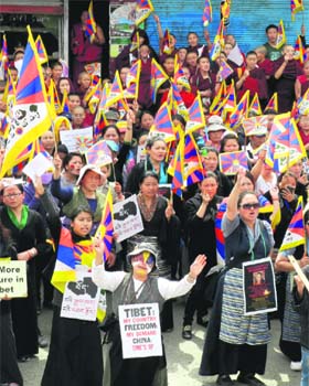 Tibetan women take out a rally in Dharamsala on Monday