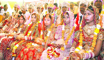 The Istri Satsang Sabha conducts a mass marriage function of 12 needy girls at Shri Mahalakshmi Mandir on Jail Road in Jalandhar on Sunday. 