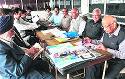 Members of the Ludhiana Philately Club during a get-together at Head Post Office in Ludhiana on Sunday. 