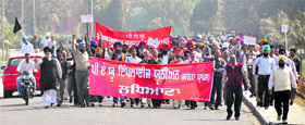 PAU union employees protest at Thapar Hall in Ludhiana. 