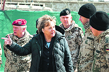 German Chancellor Angela Merkel and German Army Chief of Staff Volker Wieker (left) meet soldiers in their Armys Camp Marmal in Mazar-e-Sharif. 