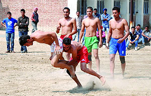 A match in progress during a state-level ITI Circle and National Style Kabaddi Tournament at the ITI in Bathinda on Tuesday. Winners of six zones of the ITIs are taking part in the two-day tournament