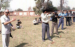 Armed security guards during the firing practice-cum-training programme organised by the security department of Punjab National Bank, Bathinda circle