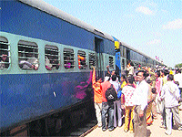 Commuters turn up in large numbers at the Sirsa railway station as train services resumed after the Jat agitation ended.