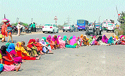 Residents of Kard village and family members of Dalbir Singh, a CBI constable, block the Panipat-Gohana road in Panipat on Tuesday.