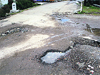 A damaged road in the Kangra valley. 