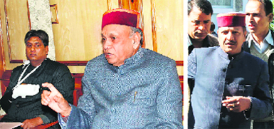 Chief Minister Prem Kumar Dhumal addresses a press conference at the Vidhan Sabha in Shimla on Tuesday; and (right) Health Minister Rajeev Bindal arrives to attend the Budget session.
