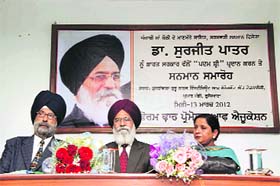Dr Surjit Patar (centre) at a felicitation function at GGNIMT in Ludhiana on Tuesday