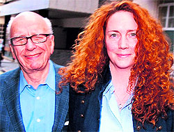 A file photo of media baron Rupert Murdoch and his aide Rebekah Brooks