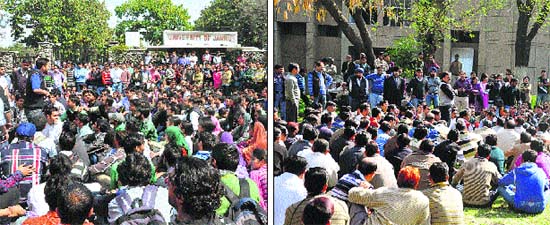 Students block a road outside the main gate; and (right) members of the non-teaching staff stage a dharna outside the Vice-Chancellors office in the University of Jammu on Wednesday