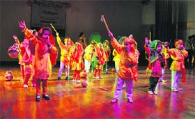 Students perform a dance during the annual day function of Nightingale Pre-School in Jammu on Wednesday