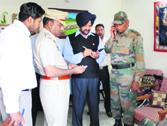 Police officials conduct investigation at the scene of crime in Amritsar