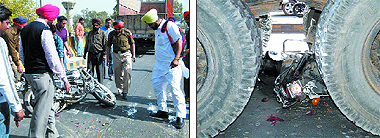 People look at the ill-fated bike that the two youths were riding before the fatal mishap took place on the Bathinda-Mansa ROB near the ITI Chowk on Thursday; the bike crushed under the wheels of the truck.