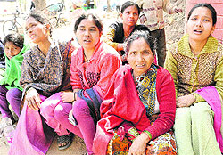 Grieving family members of the victim, Guru Prasad, at Sector 34 in Chandigarh on Thursday