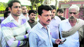 The deceased students relatives at the Civil Hospital in Yamunanagar on Thursday.