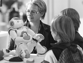 Visitors attend the three-day Innorobo 2012 fair as companies and research centres present their latest technologies in robotics in Lyon on Wednesday.