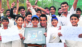 Budding cricketers celebrate Sachins 100th ton at Government Model Senior Secondary School in Sector 19, Chandigarh, on Friday.